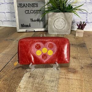 Fossil red leather heart zip around wallet womens.